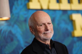 James Burrows, the legendary television director and co-creator of "Cheers," poses for a photo at a public event.