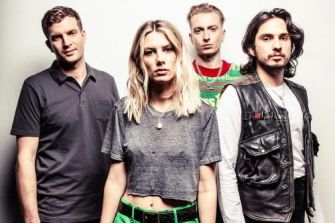 Wolf Alice band members posing for a promotional photo.