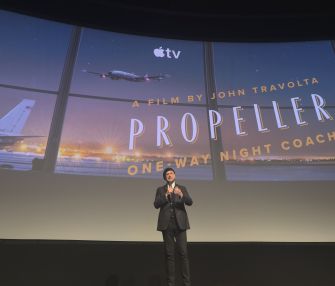 John Travolta presenting his film "Propeller One-Way Night Coach" at its Los Angeles premiere.