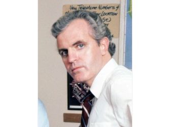 A close-up of actor James Handy while portraying a character in a scene from television.