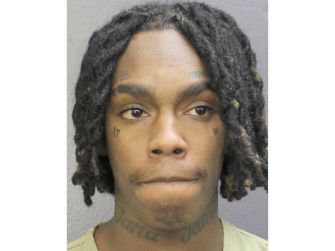 YNW Melly's mugshot, following the dropping of witness tampering charges ahead of his retrial.