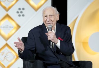 Mel Brooks speaking at an event, discussing the upcoming sequel to Spaceballs set for release in April 2027.