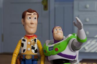 Woody and Buzz Lightyear, iconic toys from the "Toy Story" franchise, posed in a child's room setting.