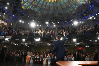 Stephen Colbert waves to a cheering audience during the finale of The Late Show, held in the Ed Sullivan Theater.