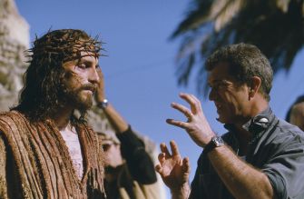Director Mel Gibson discusses a scene with an actor portraying Jesus during the filming of 'The Passion of the Christ.'