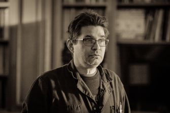 Portrait of Steve Albini, recording engineer known for his work with Nirvana and his advocacy for artistic independence in the music industry.