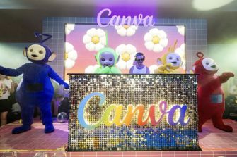 Teletubbies performing at Canva's beachside Pride party during Cannes Lions, with a colorful "Canva" sign in the background.