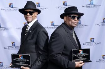 Jimmy Jam and Terry Lewis posing with their awards at the Living Legends Foundation's Atlanta Gala.