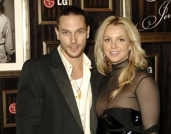 Kevin Federline and Britney Spears posing together at a red carpet event in the early 2000s.