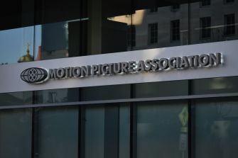 Signage for the Motion Picture Association on the exterior of their office building.