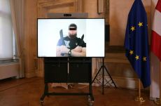 Authorities display a photo of a man arrested in connection with the plot to attack Taylor Swift's tour in Vienna