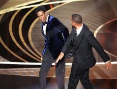 Will Smith slapping Chris Rock at the Oscars ceremony 2023